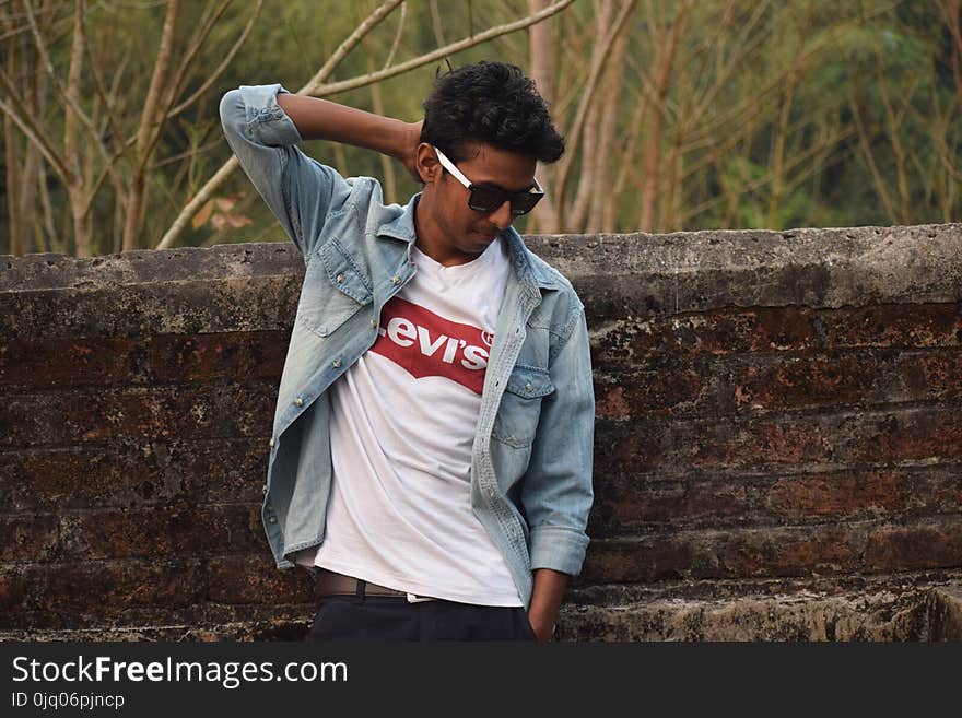 Photography of a Man Wearing Denim Jacket