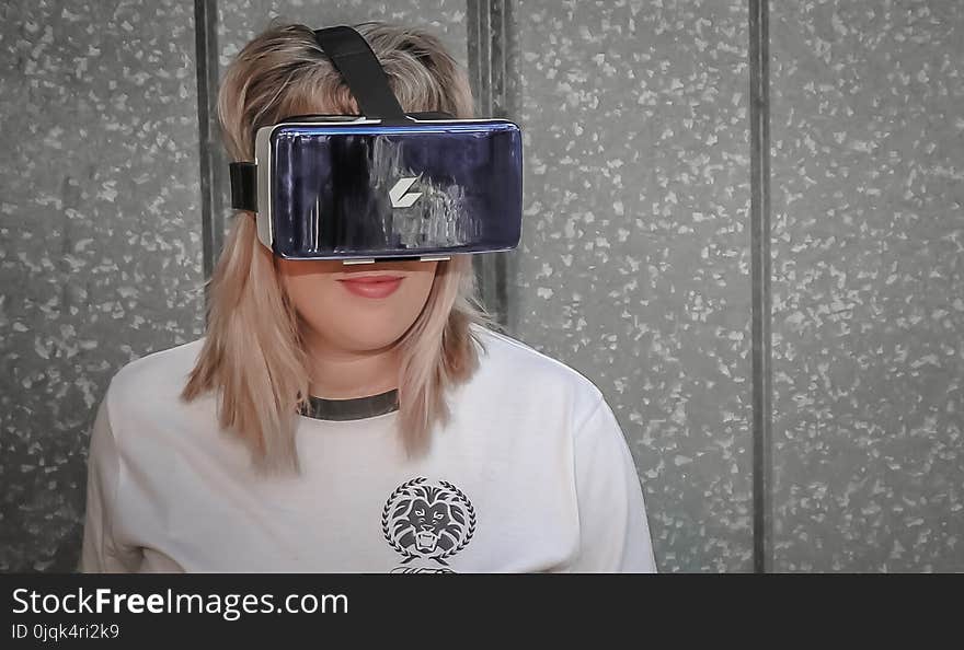 Photo of Woman Wearing Virtual Reality Headset