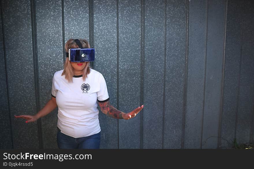 Photo of Woman Wearing Virtual Reality Headset