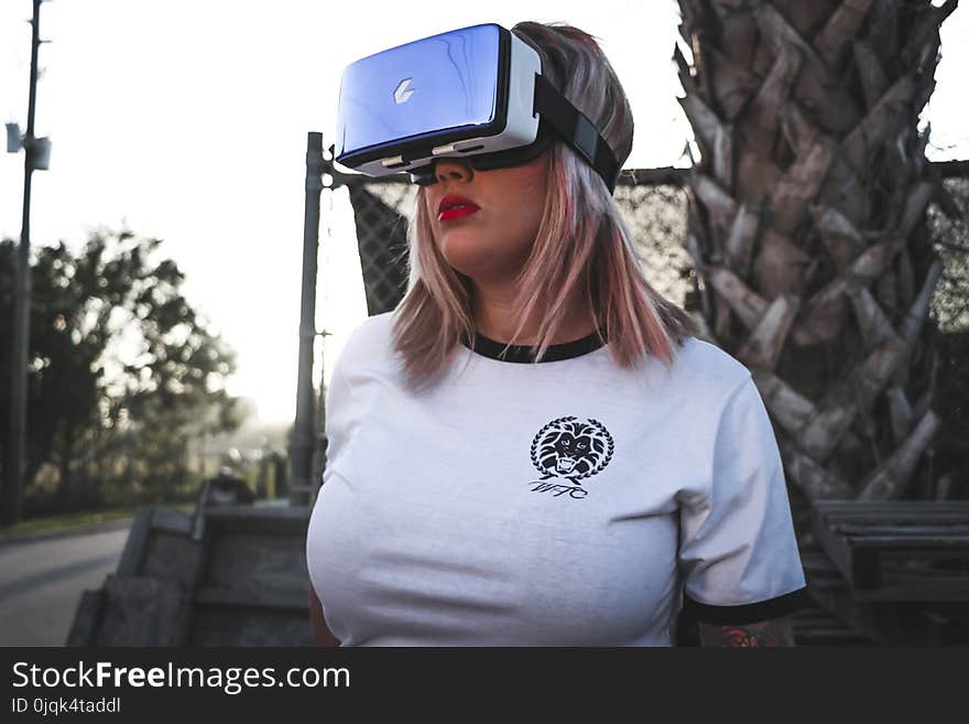 Photography of a Woman Wearing Virtual Reality Headset