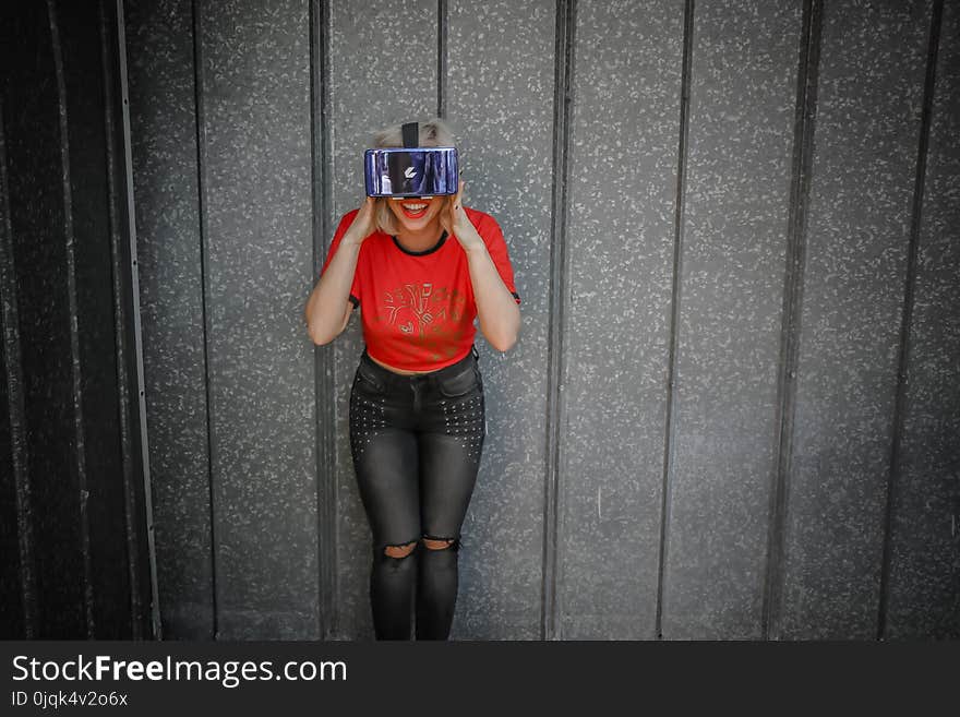 Photo of Woman Wearing Red Crew Neck T-shirt