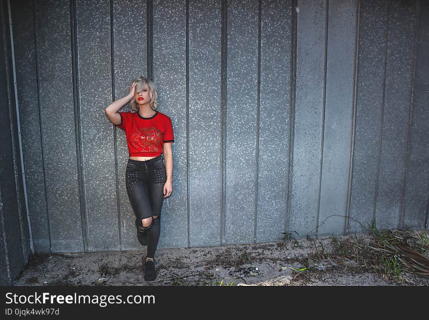 Photo of a Woman Wearing Red T-Shirt