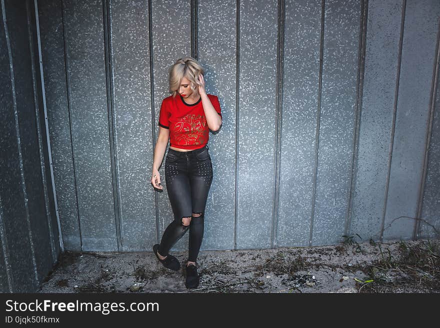 Photo of Woman in Red Crew Neck T-shirt