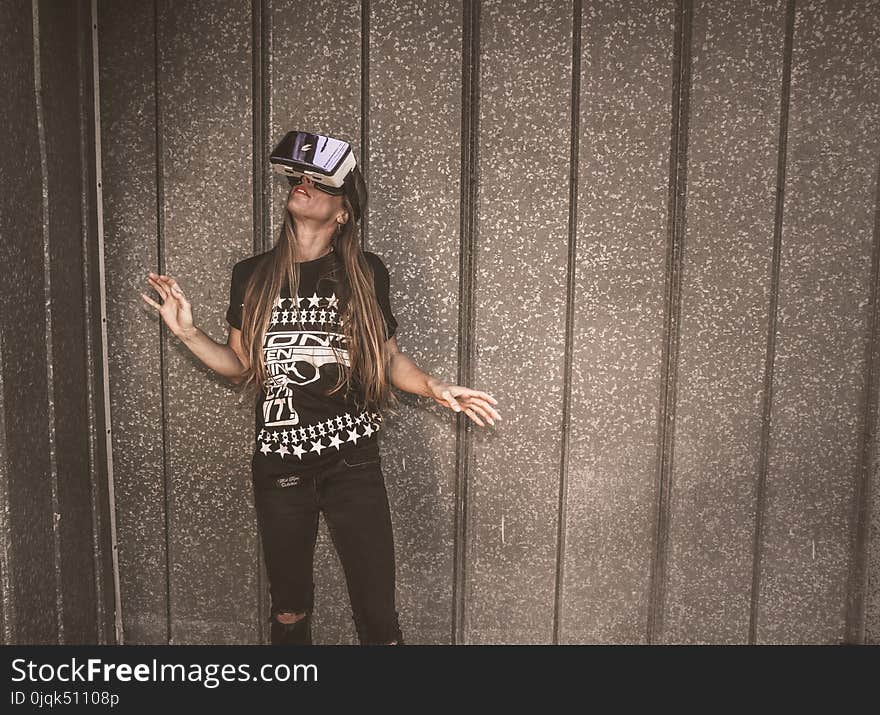 Photography of a Woman Wearing Virtual Reality Headset