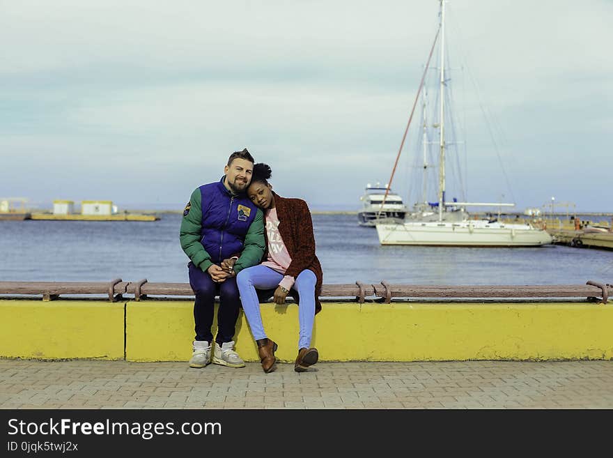 Man and Woman Sitting