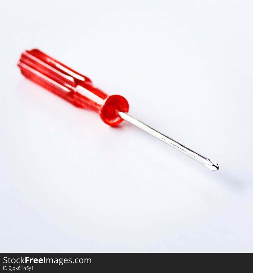 Close-Up Photography of Red Screwdriver