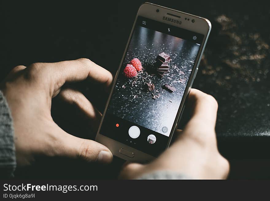 Gray Samsung Smartphone Showing Chocolates