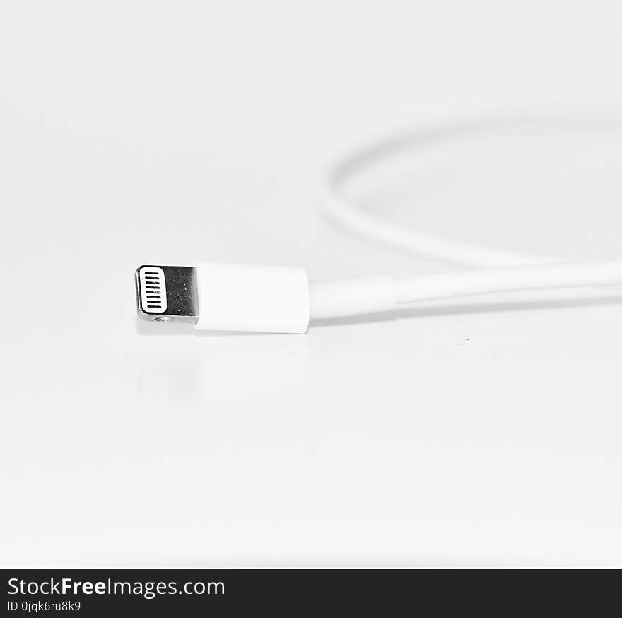 Close-Up Photography of White iPhone Charger