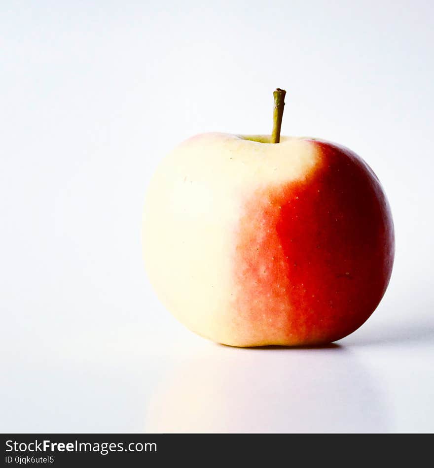 Close-Up Photo Of Apple