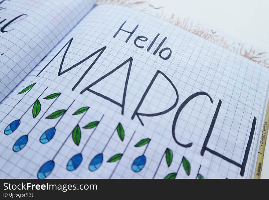 Hello March Printed Paper on White Surface