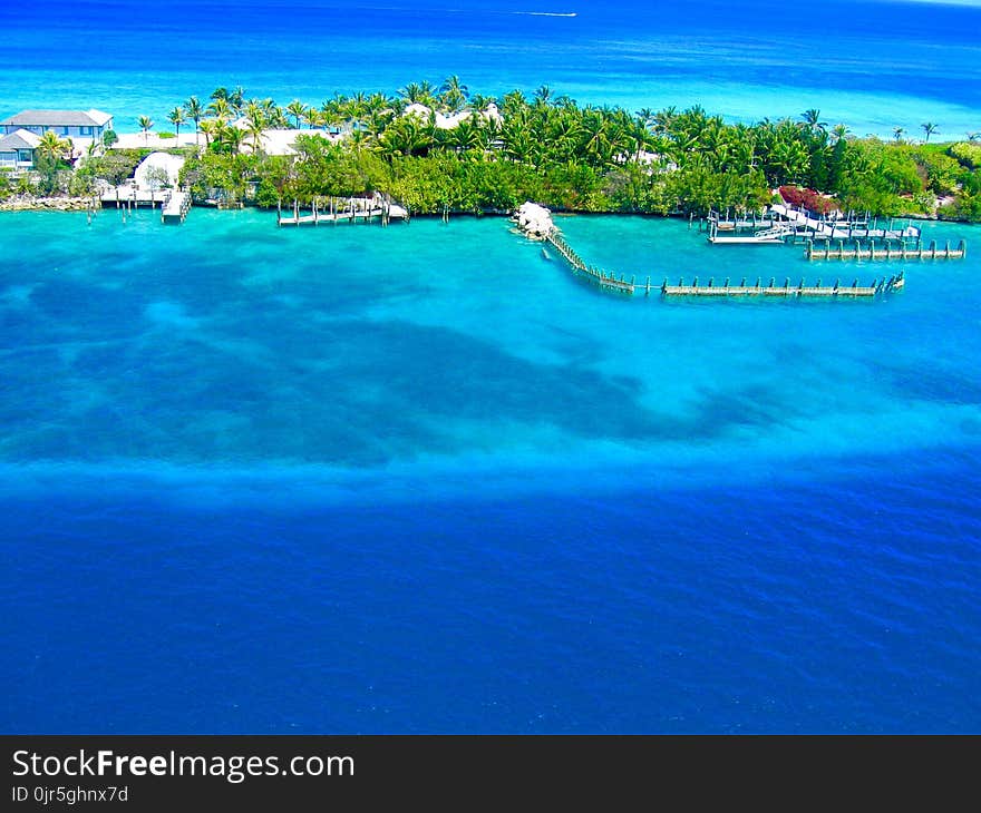 Landscape Photography of Island Surrounded Body of Water