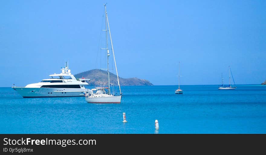 Body of Water and White Yacht