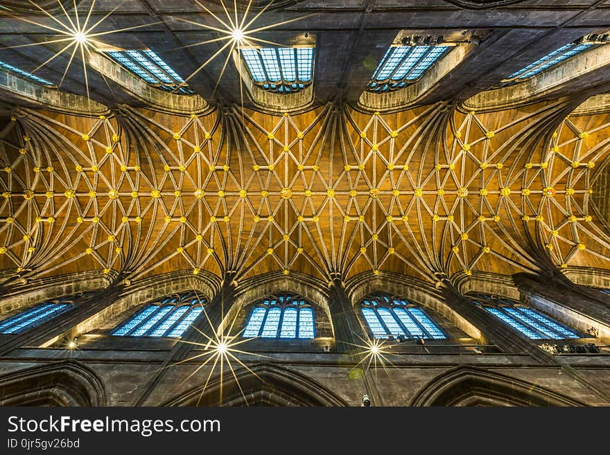 Low Angle Photography of Brown Concrete Building Interior