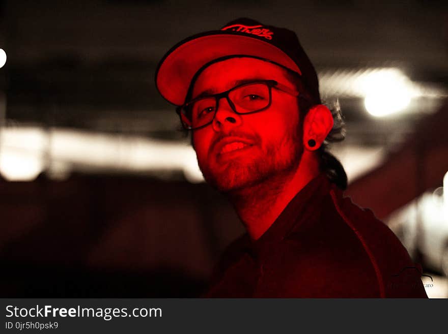 Man With Cap and Eyeglasses