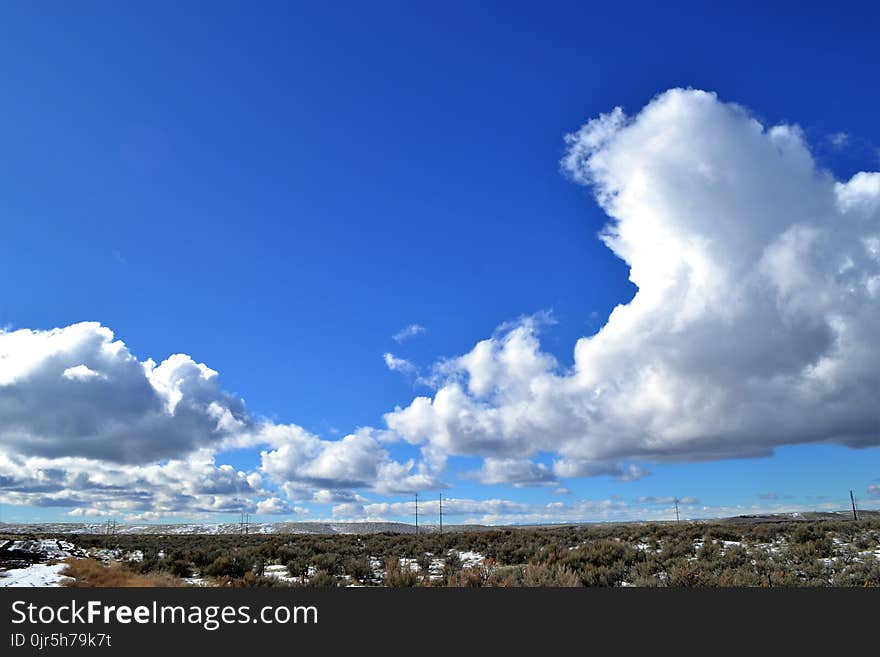 Aerial Photography of Metropolitan Under White Clouds