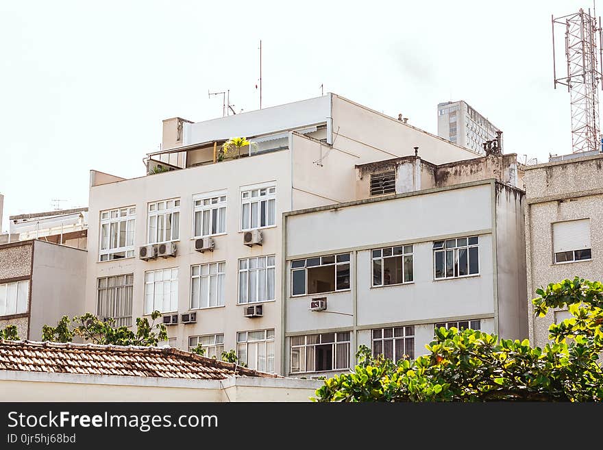 White and Beige Concrete High-rise Building