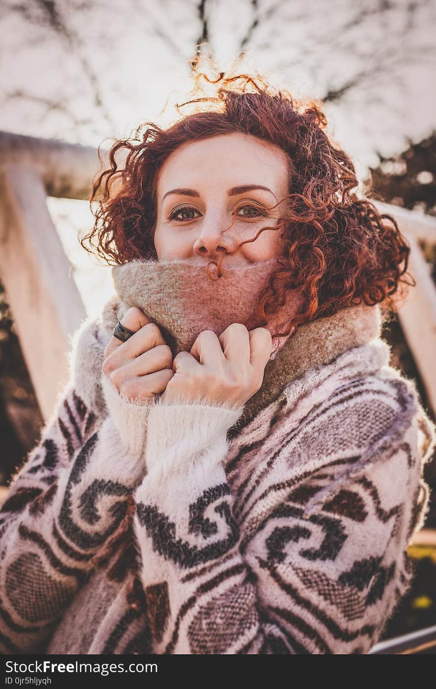 Woman Wearing Grey and Black Sweater Photo