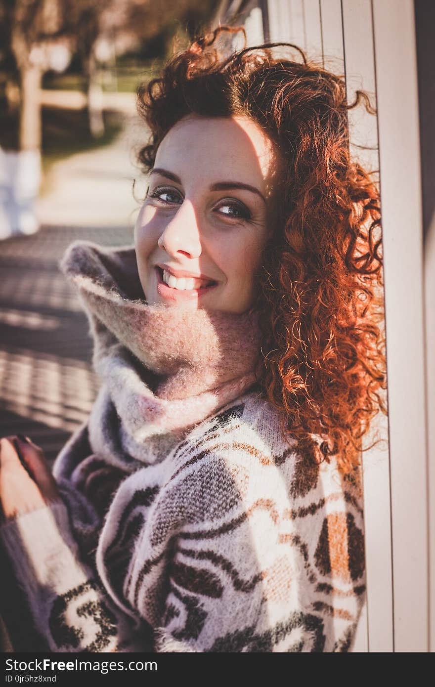 Woman Wearing White and Brown Shirt