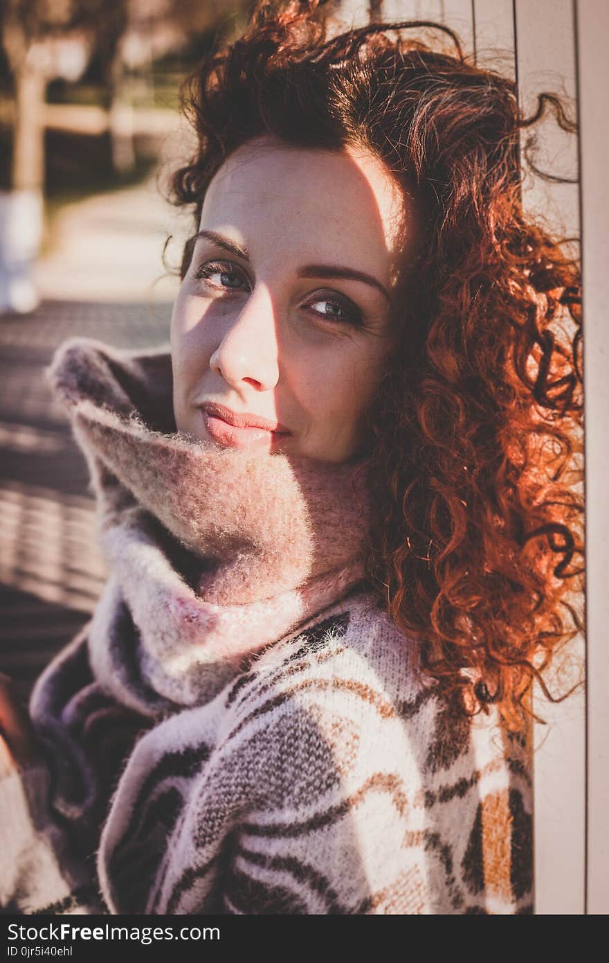 Woman Wearing White and Brown Top