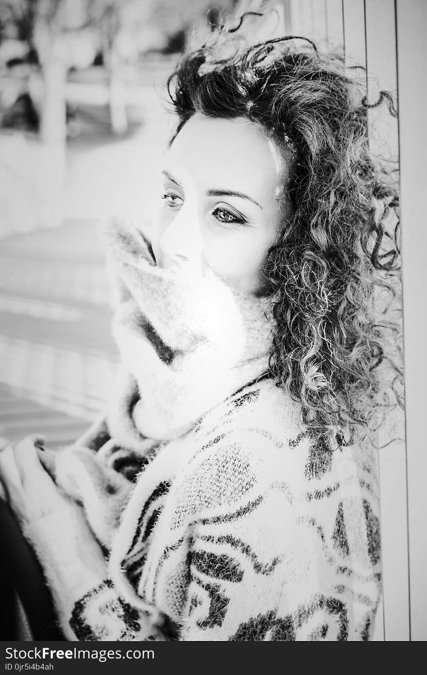 Grayscale Photo of Woman Wearing Knitted Top