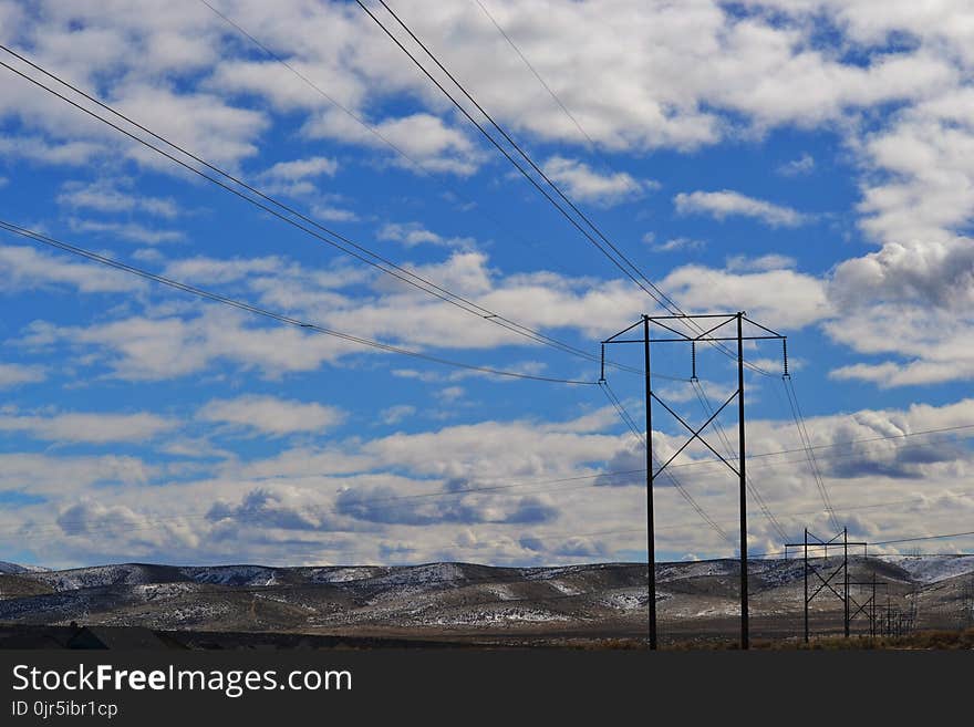 Electric Tower Under Cloudy Sky