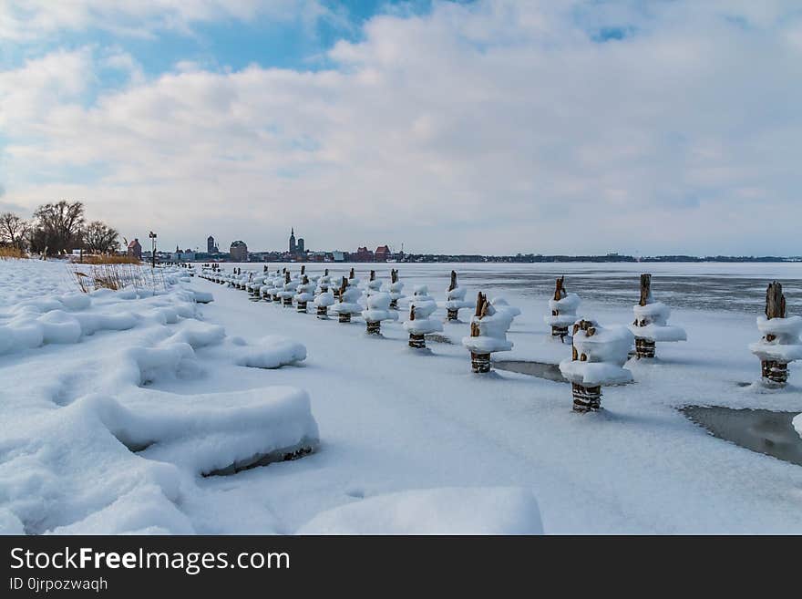 Photo of Log Covered With Snow