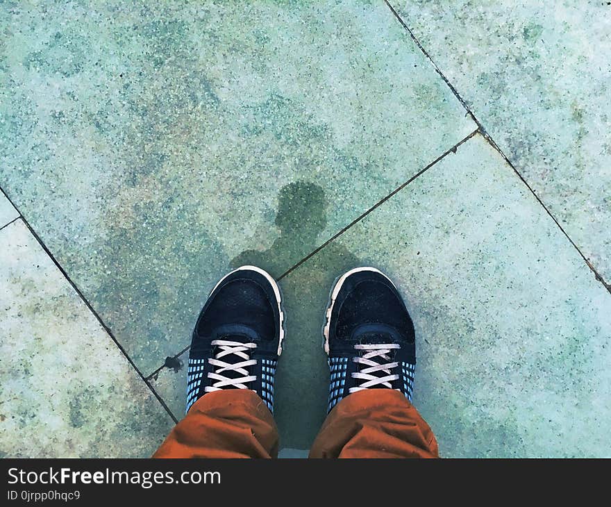 Person Wears Black-and-white Running Shoes