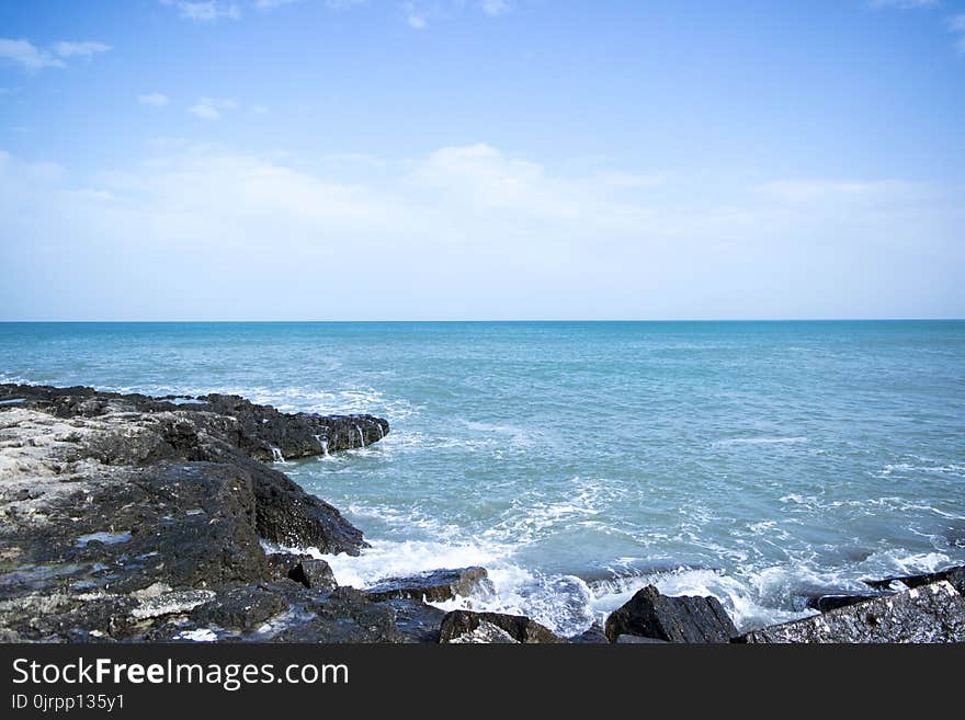 Ocean View With Black Rock Formation