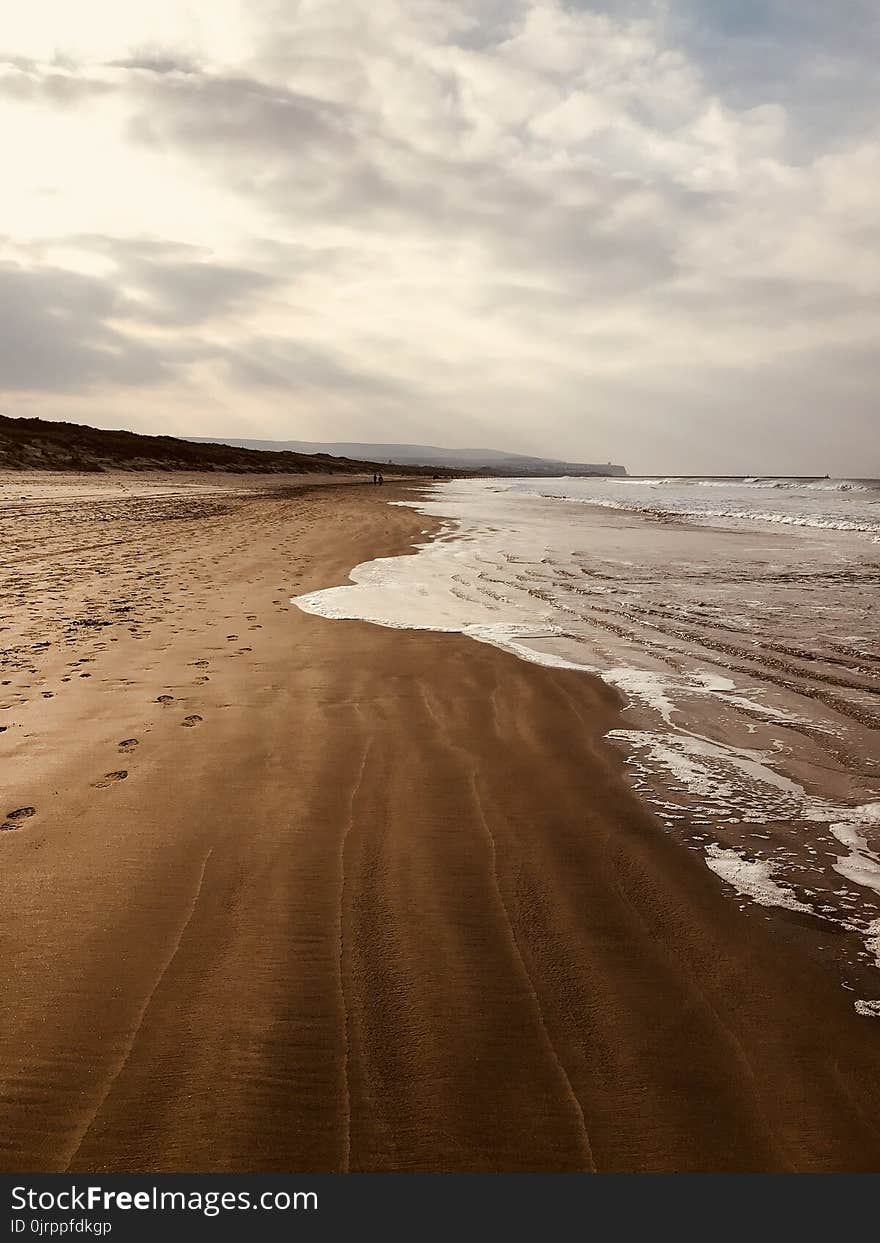 Empty Brown Sand Seashore