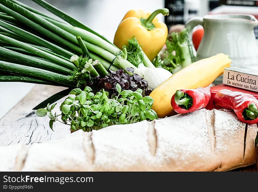 Assorted Vegetable and Bread on Brown Wooden Table