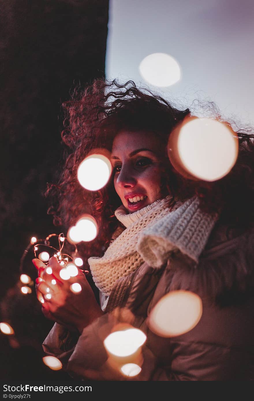 Woman Wearing Brown Leather Jacket and Knitted Scarf