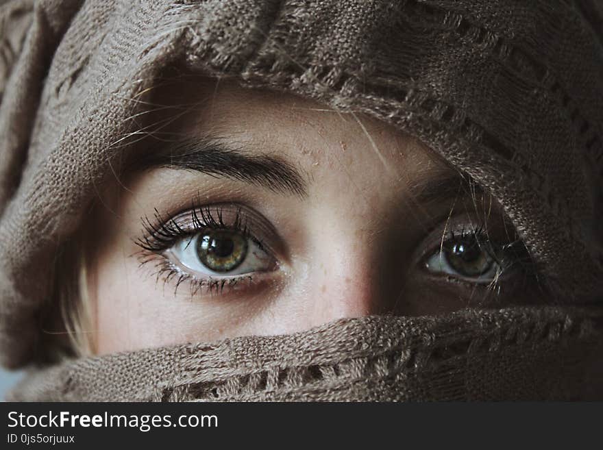 Photo of Person Covered With Brown Textile