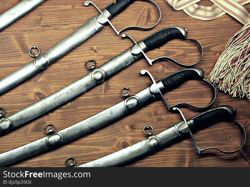 Several Black Handled Bayonets