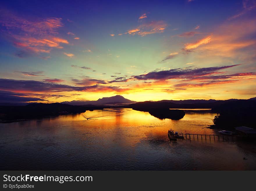 Silhouette of Mountain during Sunset