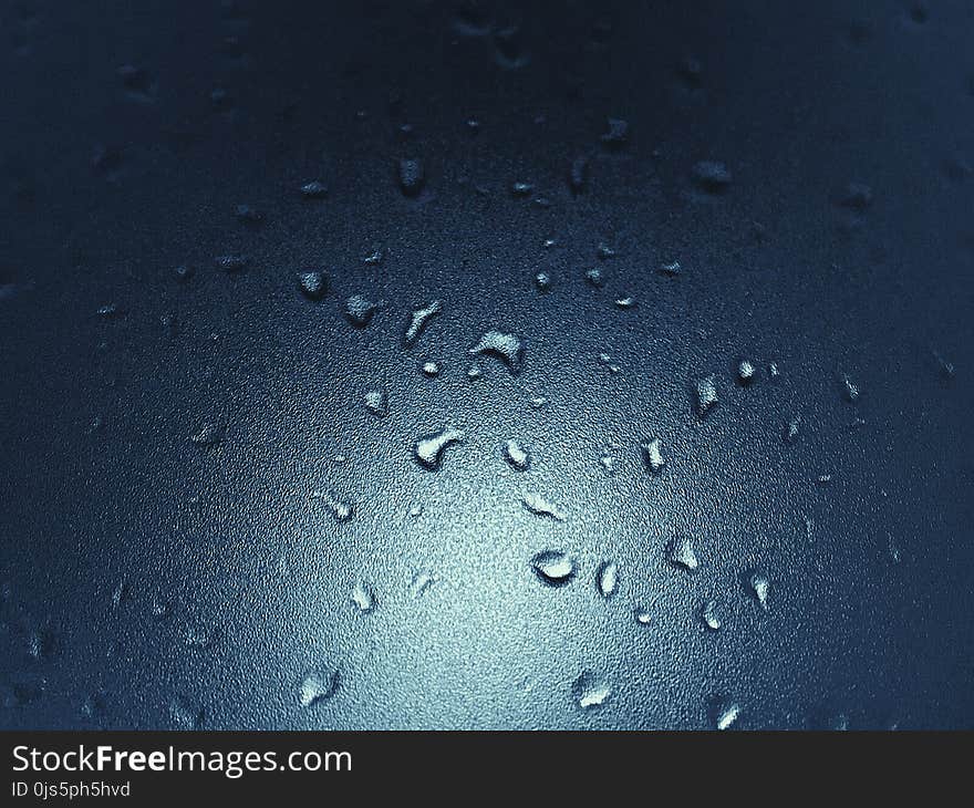 Water Droplets on Glass Surface