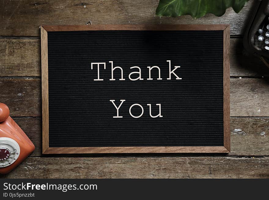 Thank You Text on Black and Brown Board