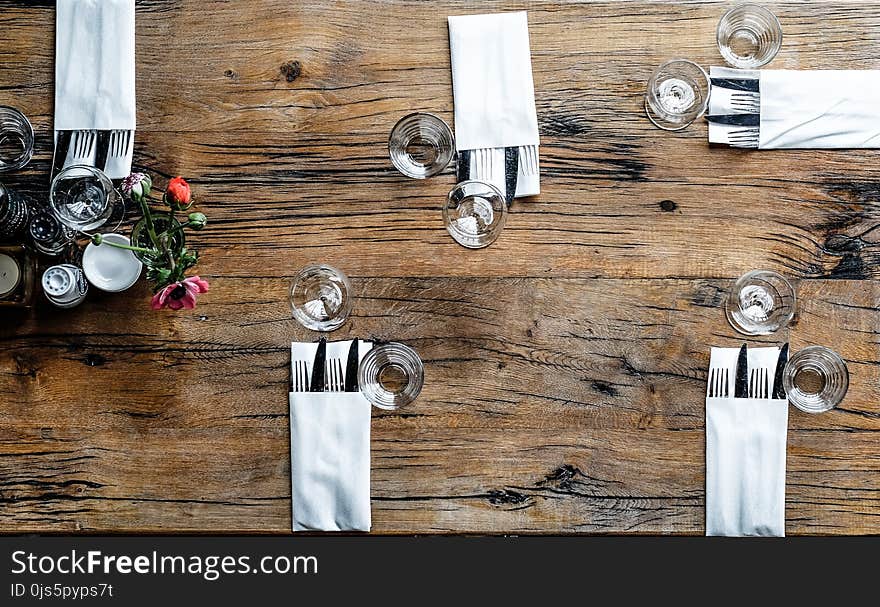 High-angle Photography of Utensils With Napkins