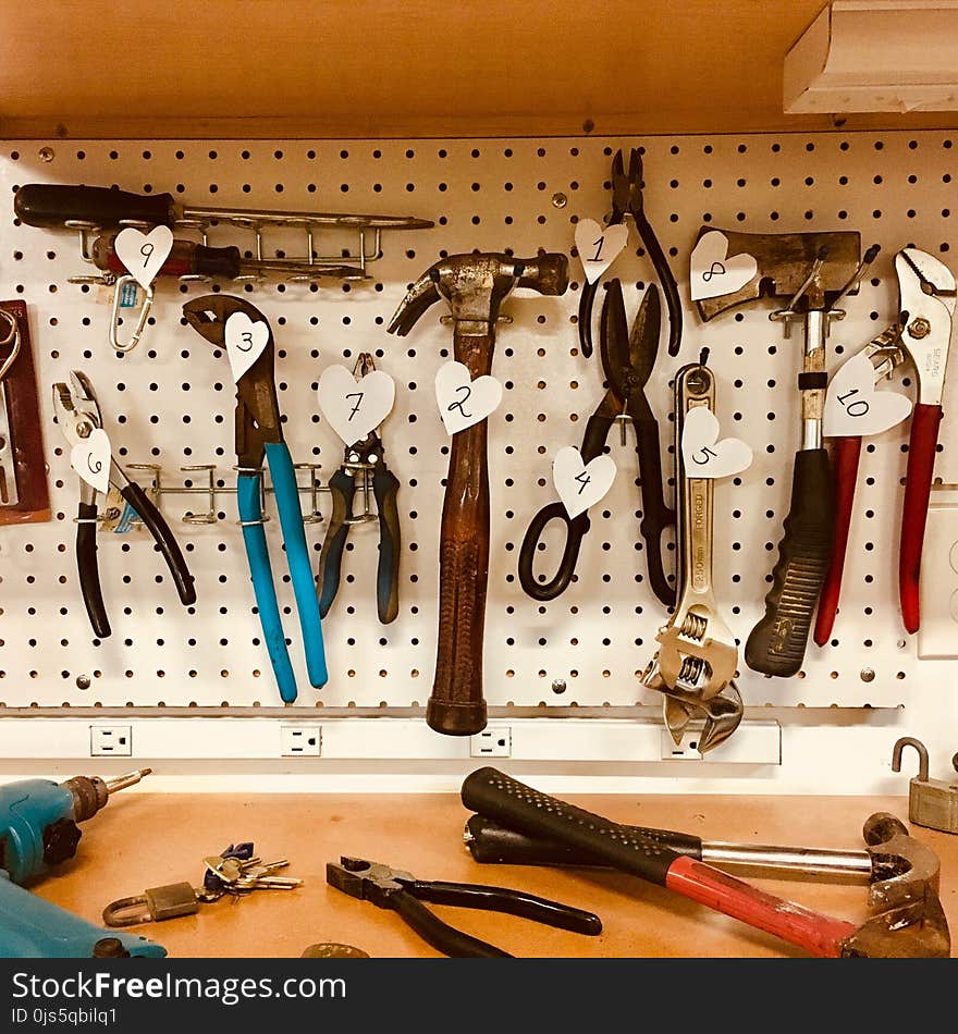 Handheld Tools Hang on Workbench