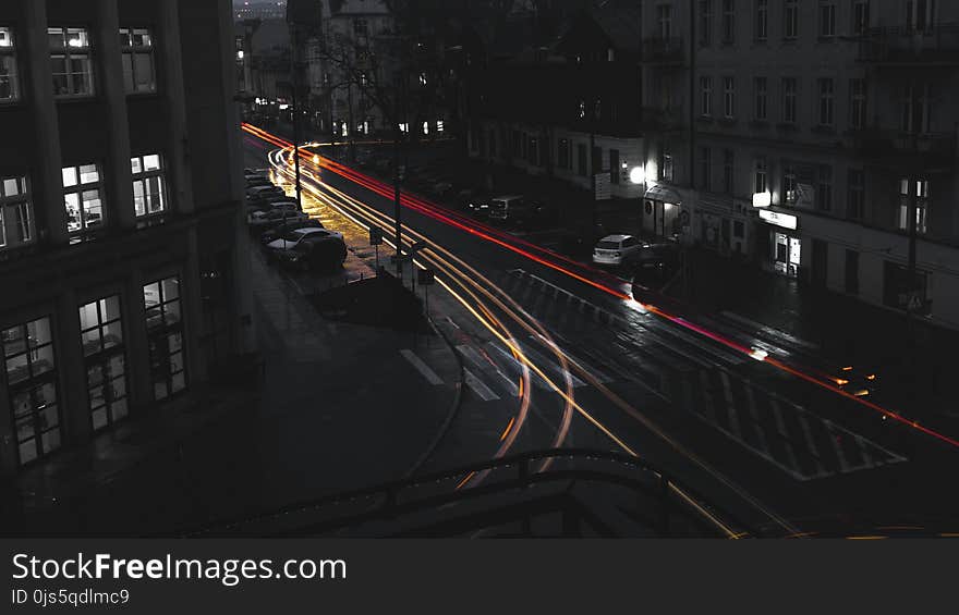 Time Lapse Photography of Car Headlight on Asphalt Road