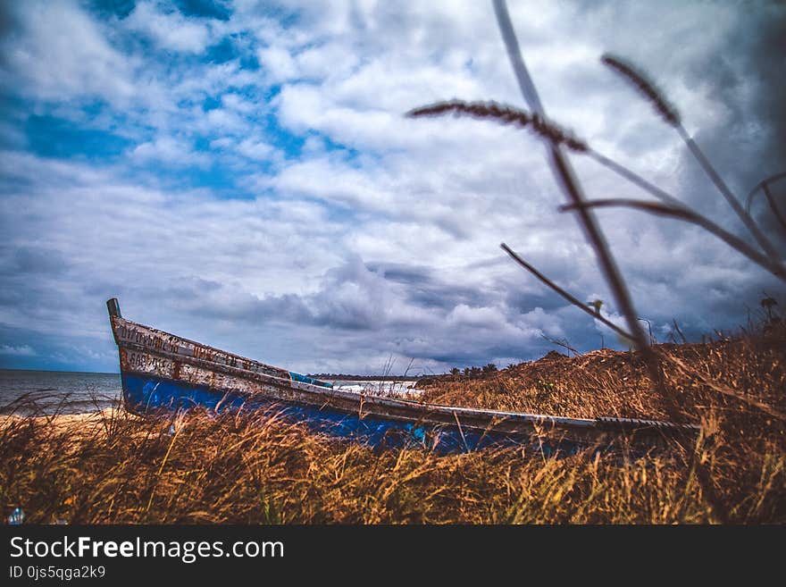 Blue Canoe Under the Blue Sky