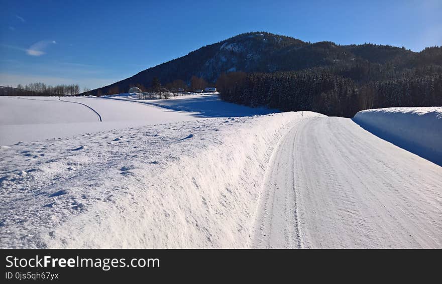 Landscape of Field Covered With Snow