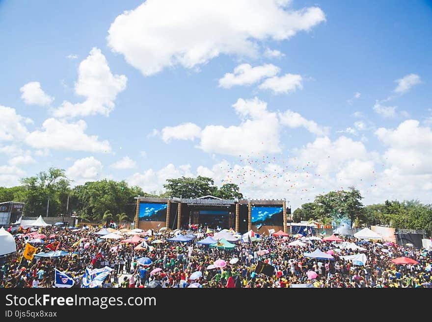 Black and Blue Stage Under Blue Daytime Sky