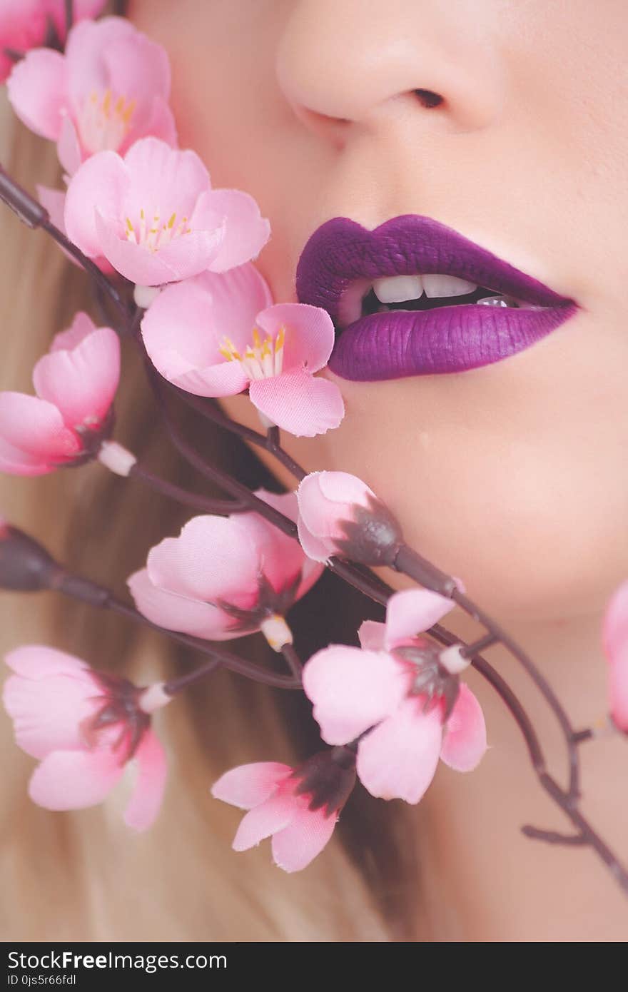 Woman Showing Her Purple Lipstick