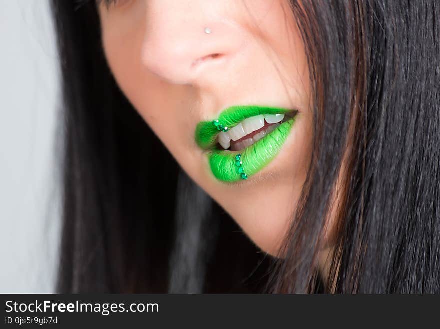 Focus Photography of Woman Wearing Green Lipstick