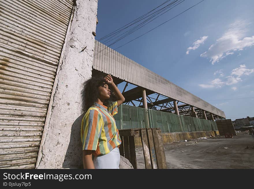 Woman in a Colorful Striped Shirt