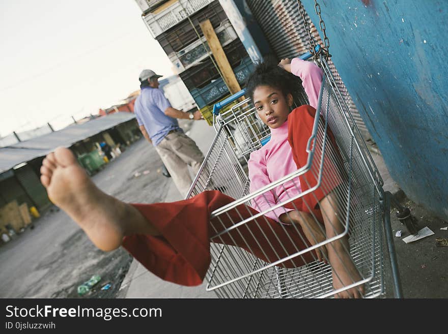 Woman in a Grocery Cart