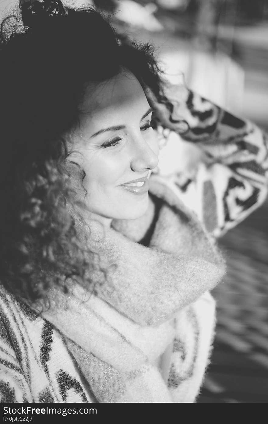 Grayscale Photo of Man in Scarf and Sweater