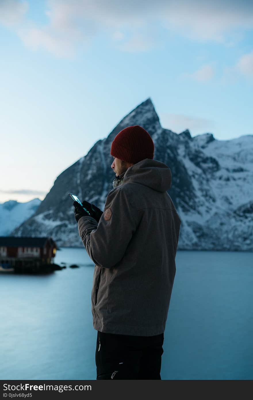 Man in Gray Jacket in Shallow Focus Lens