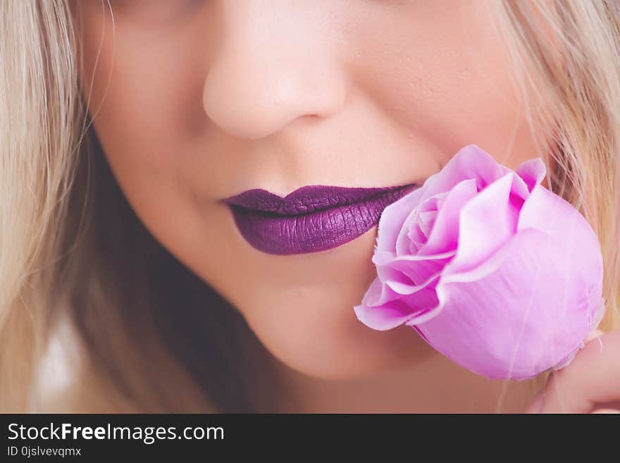 Woman Holding Pink Rose Flower