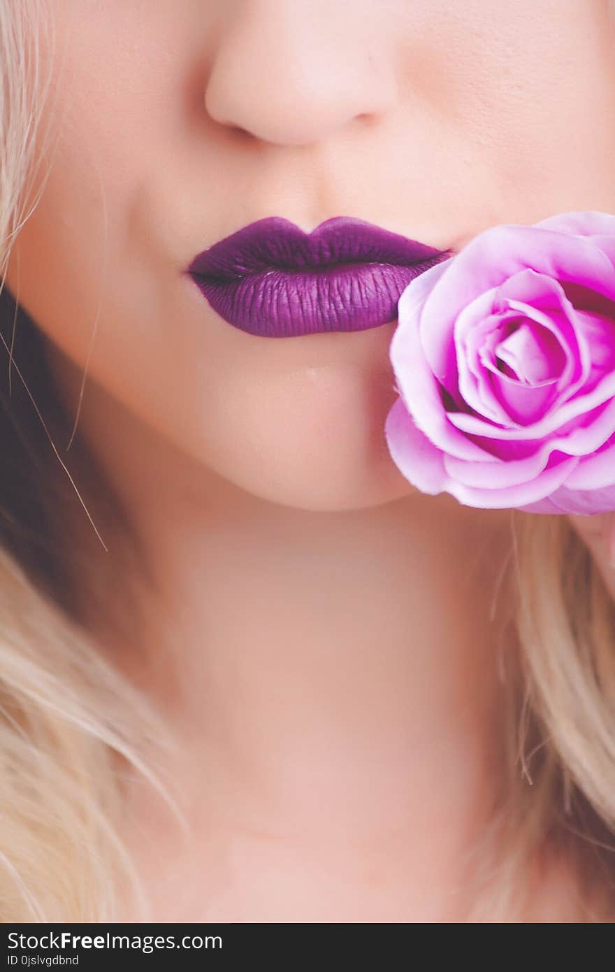 Portrait Photo of Woman&#x27;s Purple Matte Lipstick